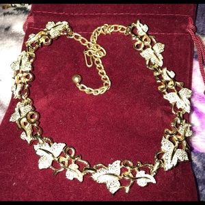 Gold Colored And Rhinestone Leaves Necklace.